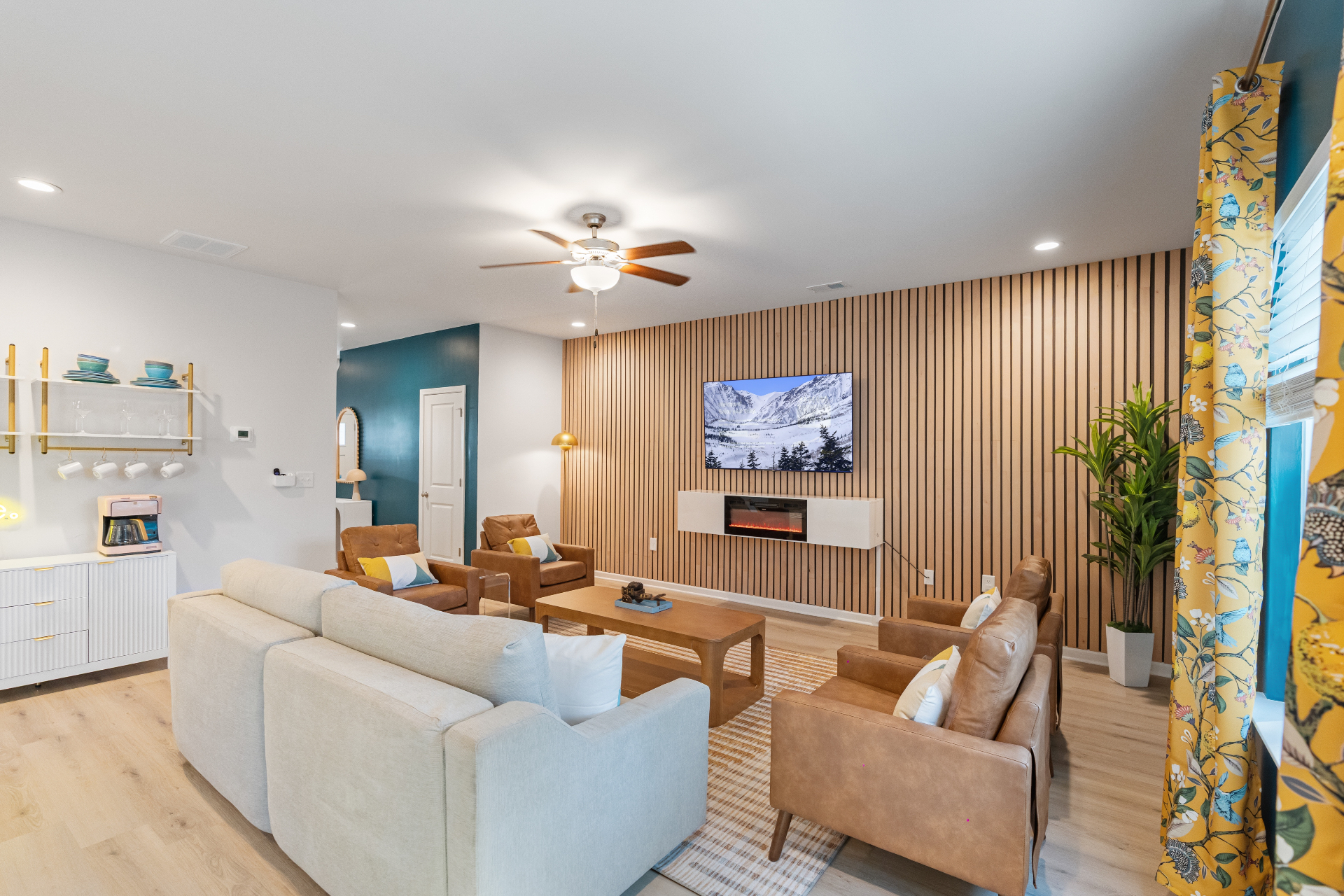 Designer living room with wood slat accent wall